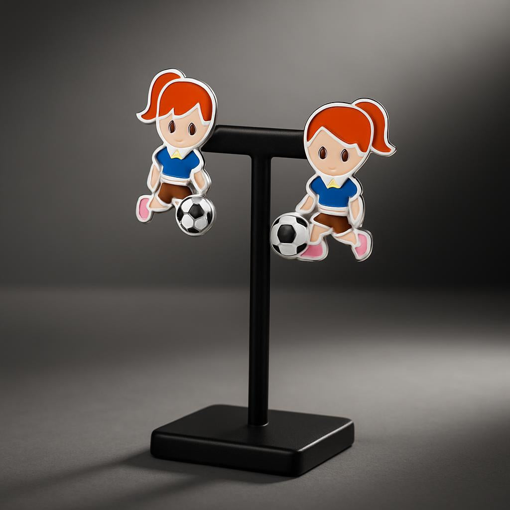 girls football stud earrings featuring a cartoon girl playing football in blue kit