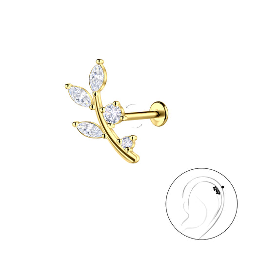 Geometric titanium leaf labret earring in gold with clear gemstones from Melchior Jewellery