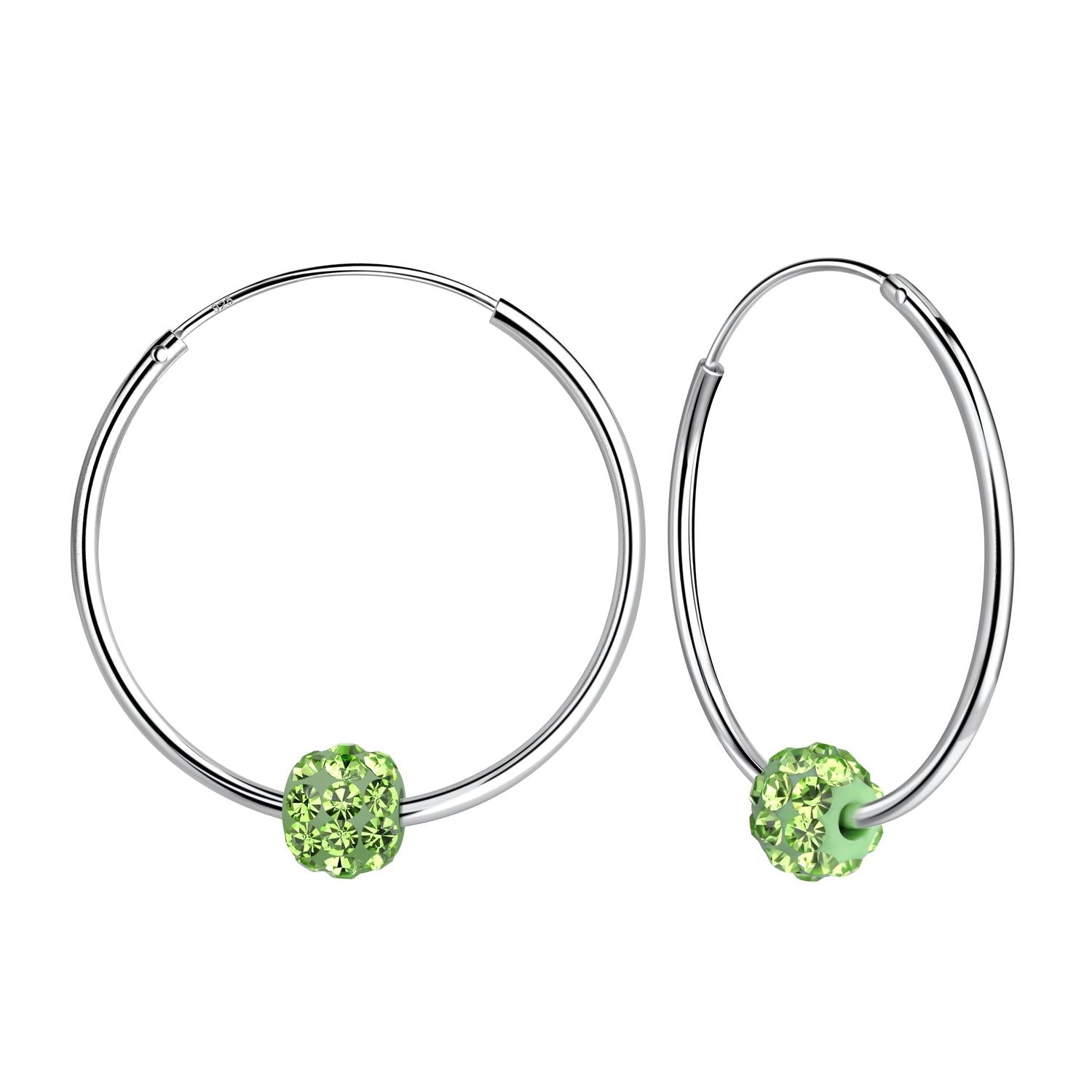 Sterling silver hoop earrings with green peridot crystal ball charm for stylish everyday wear