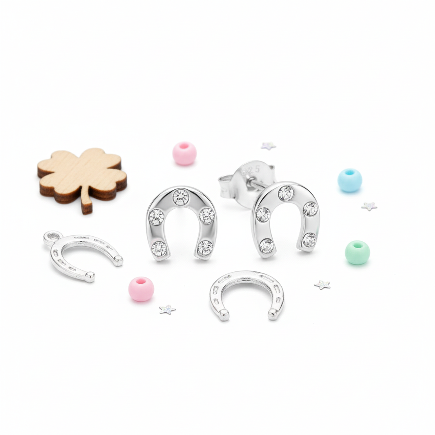 Melchior Jewellery sterling silver horseshoe earrings with crystal details and lucky charm design