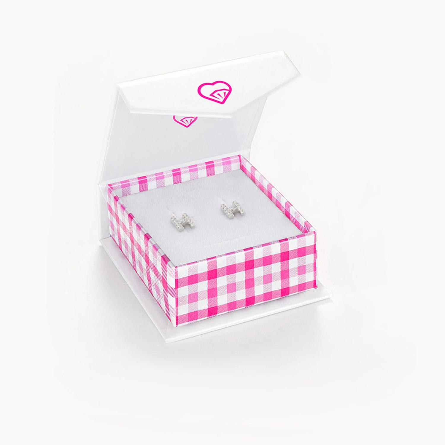 Girls sterling silver initial H earrings displayed in a pink and white checkered jewellery box by In Season Jewellery