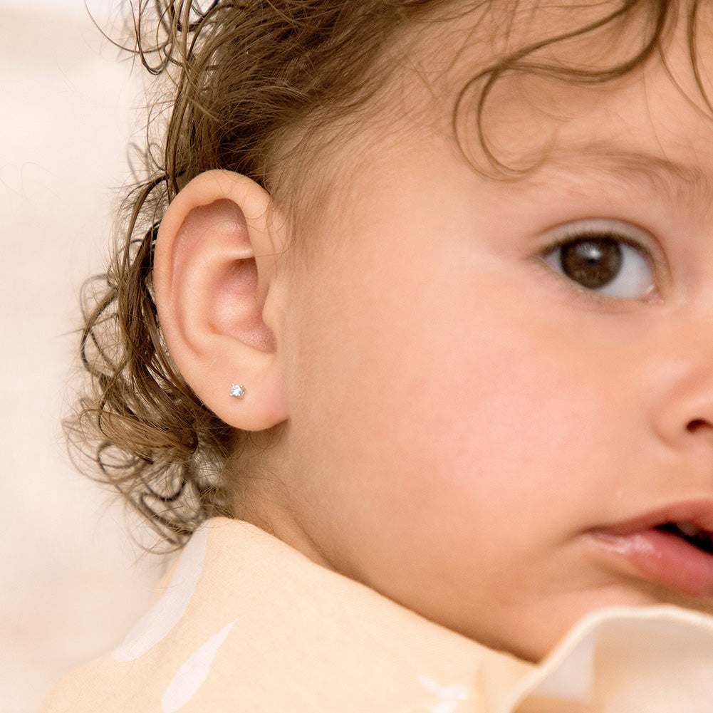 3mm kids safe earrings with secure backs worn by child from In Season Jewellery