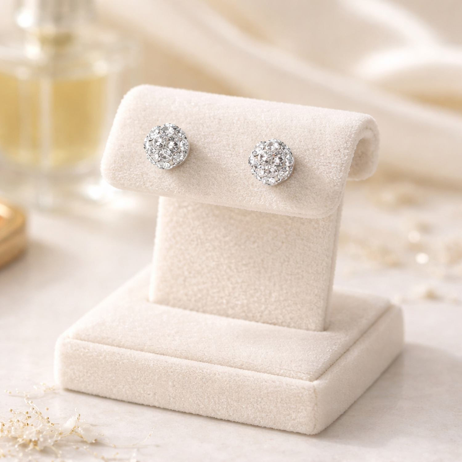 Melchior Jewellery kids crystal ball stud earrings sparkling with clear crystals on cream display