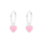 Kids silver heart charm earrings with pink glitter hearts on silver hoops by Melchior Jewellery