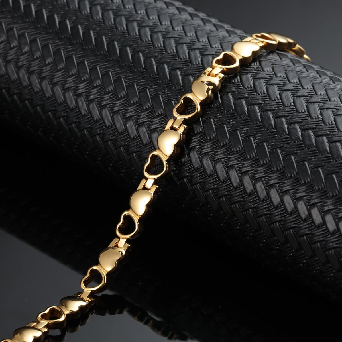 4 in 1 stainless steel bracelet for women by Melchior Jewellery featuring gold heart-shaped links