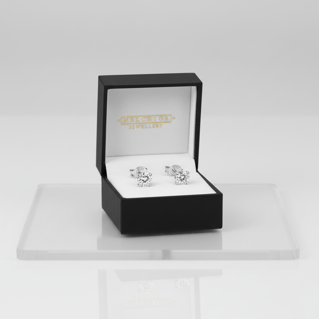 Melchior Jewellery 4mm round cubic zirconia earrings in silver-tone studs with black gift box
