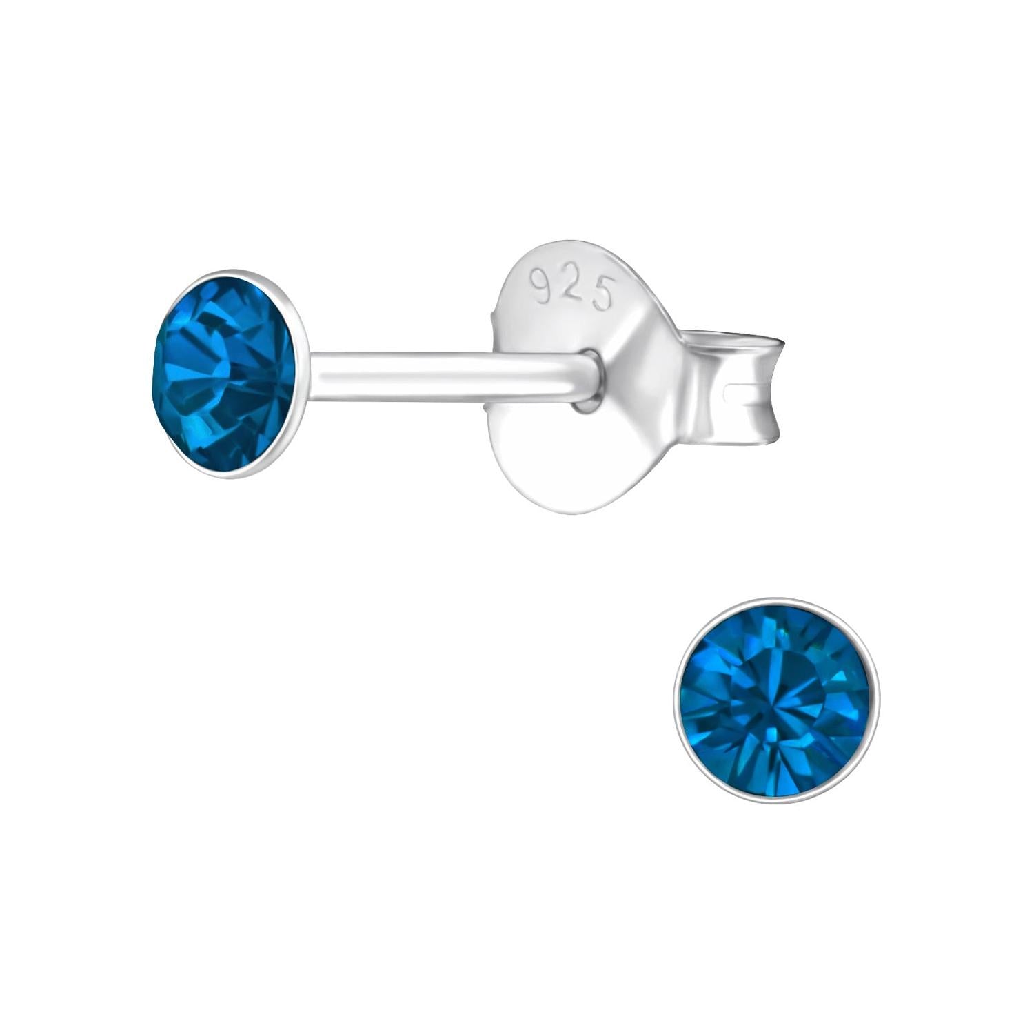 Melchior Jewellery 4mm round cubic zirconia earrings with vivid blue stones set in sterling silver