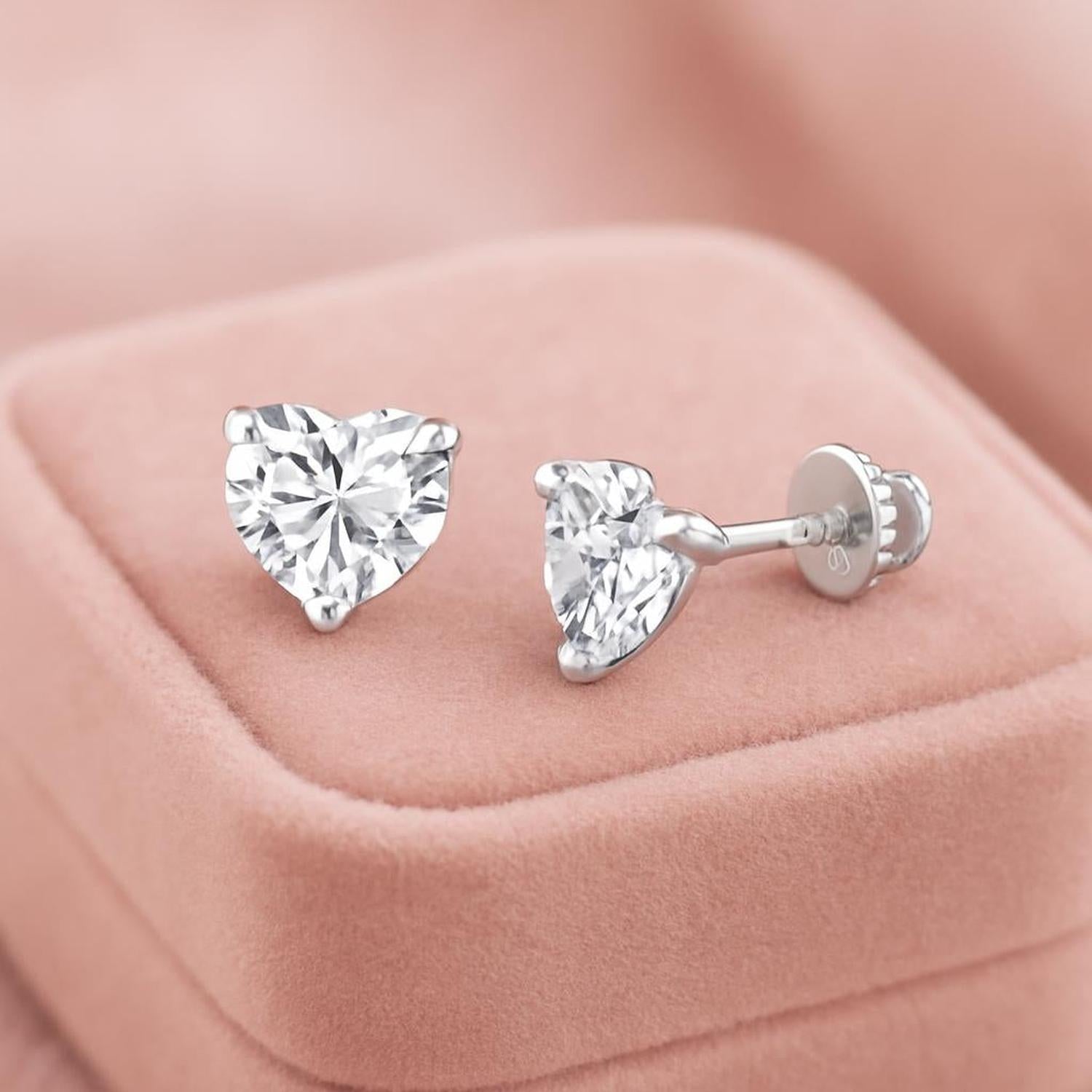 6mm CZ screw back earrings for girls by Melchior Jewellery heart-shaped cubic zirconia studs on pink velvet