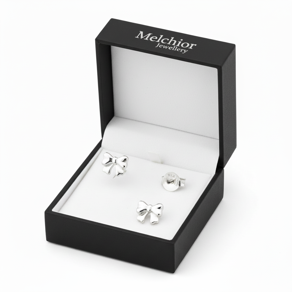 Melchior Jewellery childrens bow design silver earrings in black presentation box
