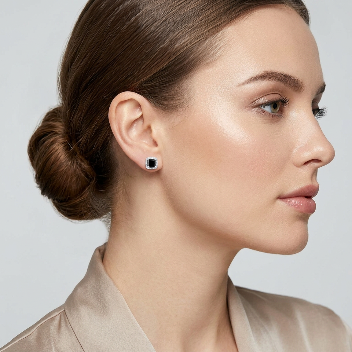 Elegant bridal black stud earrings with square black stones and silver settings worn by model