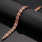 Melchior Jewellery copper butterfly design magnetic therapy bracelet with linked flower motifs and black magnets