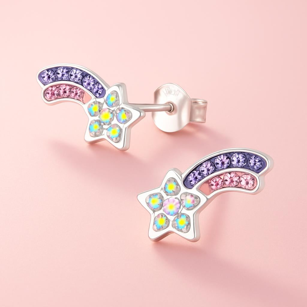 Colourful crystal star stud earrings for kids by Melchior Jewellery on pink background