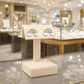 Colourful rainbow stud earrings girls by Melchior Jewellery displayed on beige stand in jewellery store
