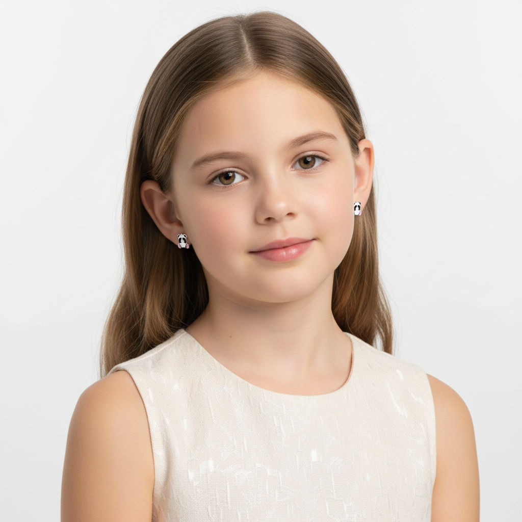 Melchior Jewellery cute panda earrings for girls worn by young girl with long brown hair in white dress