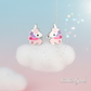 Cute unicorn CZ earrings for kids by Melchior Jewellery displayed on a fluffy cloud background