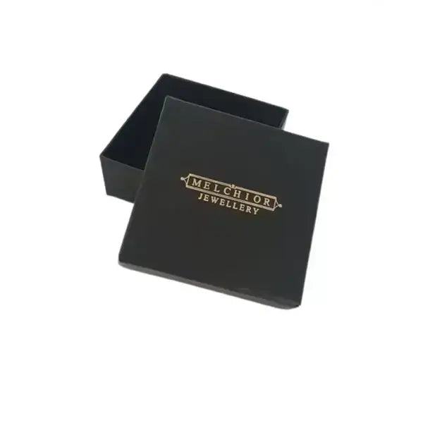 Open black Melchior Jewellery gift box for In Season Jewellery packaging of cz mouse stud earrings for girls
