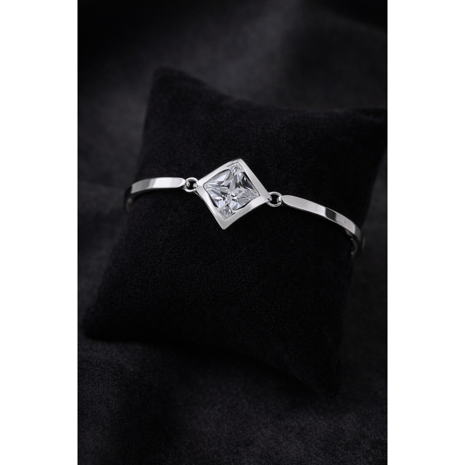 Sentiell diamond shape cubic zirconia bracelet for women with silver band on black cushion