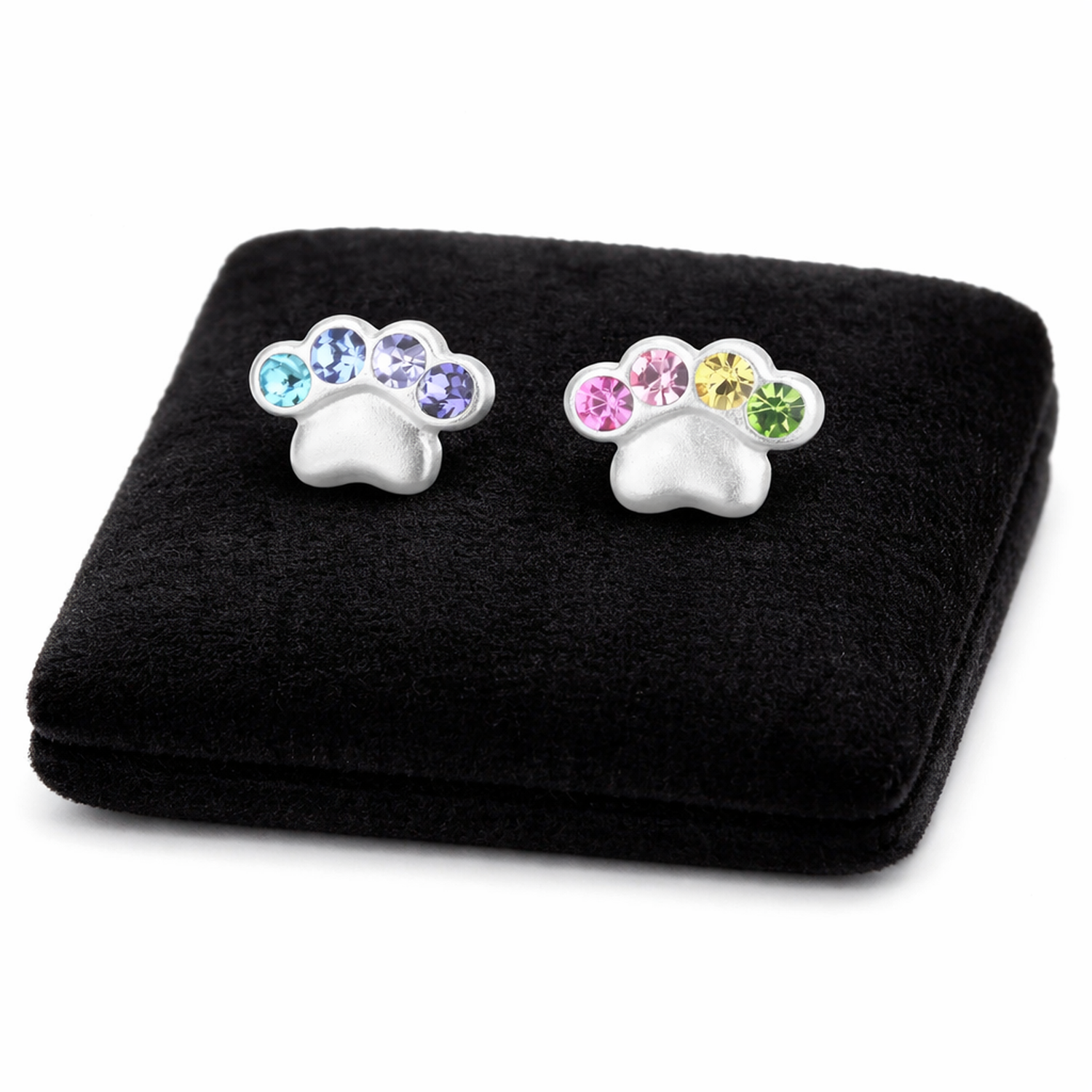 Melchior Jewellery dog paw print earrings for children with colourful gemstones on black cushion