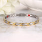 Elegant two tone magnetic bracelet by Melchior Jewellery featuring gold and silver links on marble surface