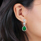 Melchior Jewellery Emerald Icon Drops Earrings with green teardrop stone and sparkling diamonds