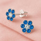 Melchior Jewellery flower stud earrings for children with blue and clear gemstones in silver setting