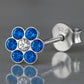 Melchior Jewellery flower stud earrings for children with blue and clear gemstones in sterling silver