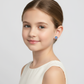 Melchior Jewellery flower stud earrings for children worn by young girl with blue floral design