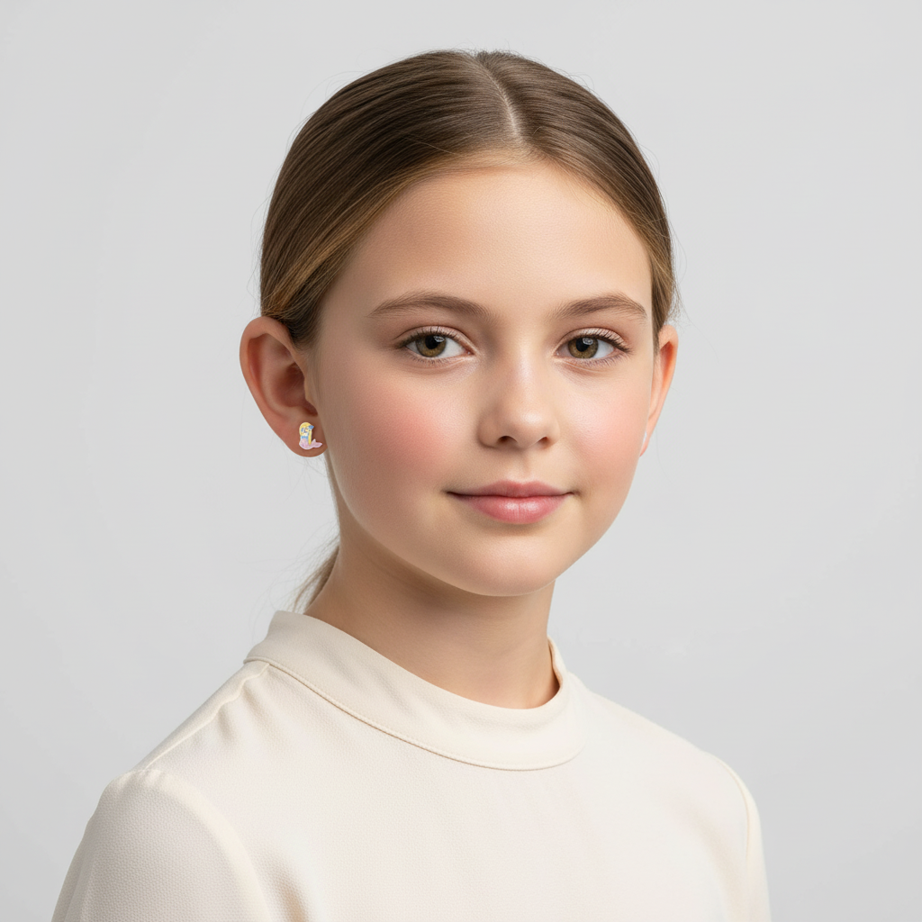 Young girl wearing glitter mermaid earrings for girls from Melchior Jewellery in close-up portrait