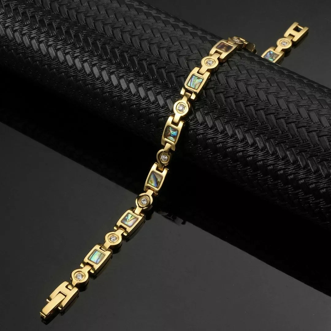 Gold healing magnetic bracelet for women by Melchior Jewellery with blue stones and round accents