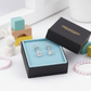 In Season Jewellery hypoallergenic kids earrings screw back with cubic zirconia in black gift box
