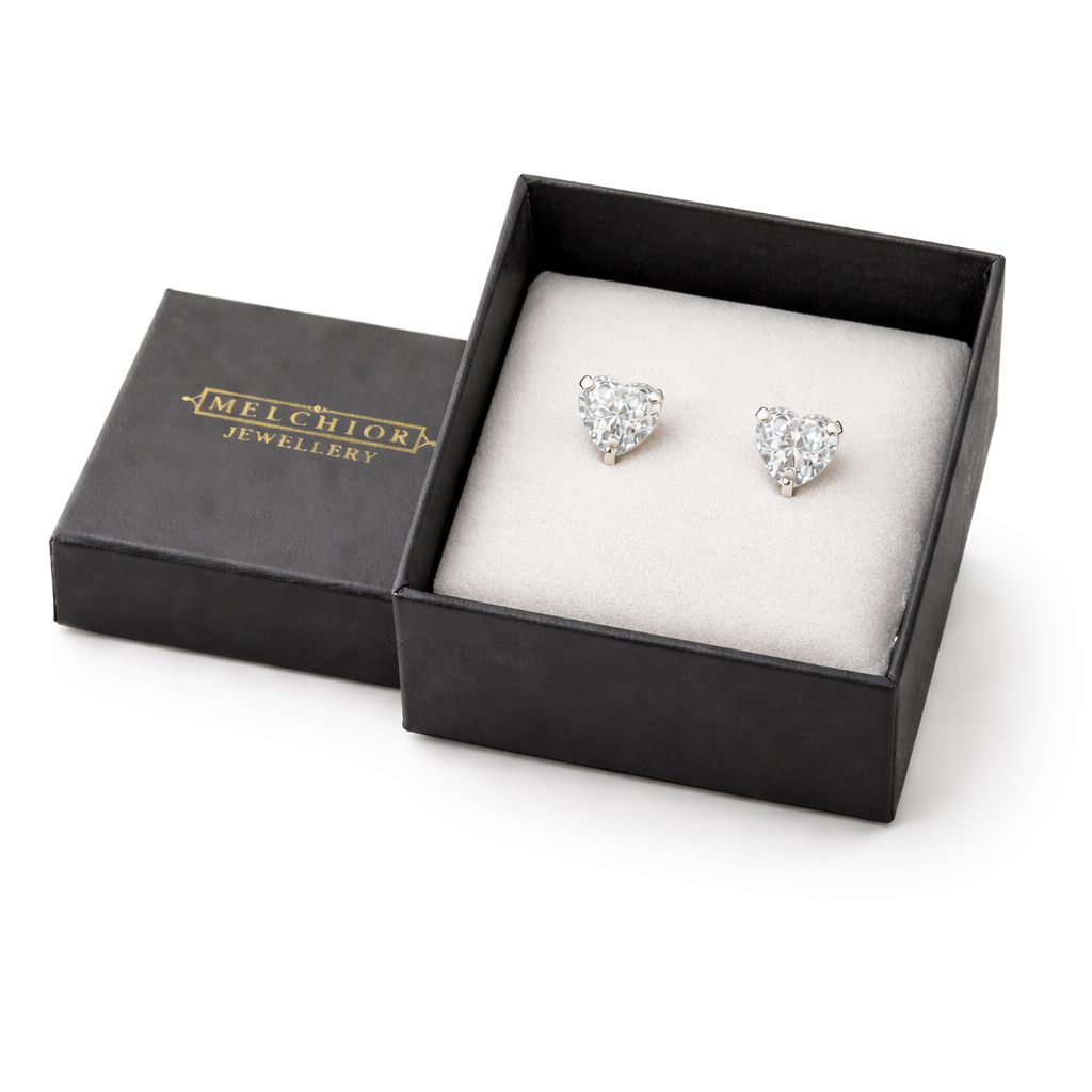 Melchior Jewellery Icon Heart Stud Earrings sparkling in black gift box on white background