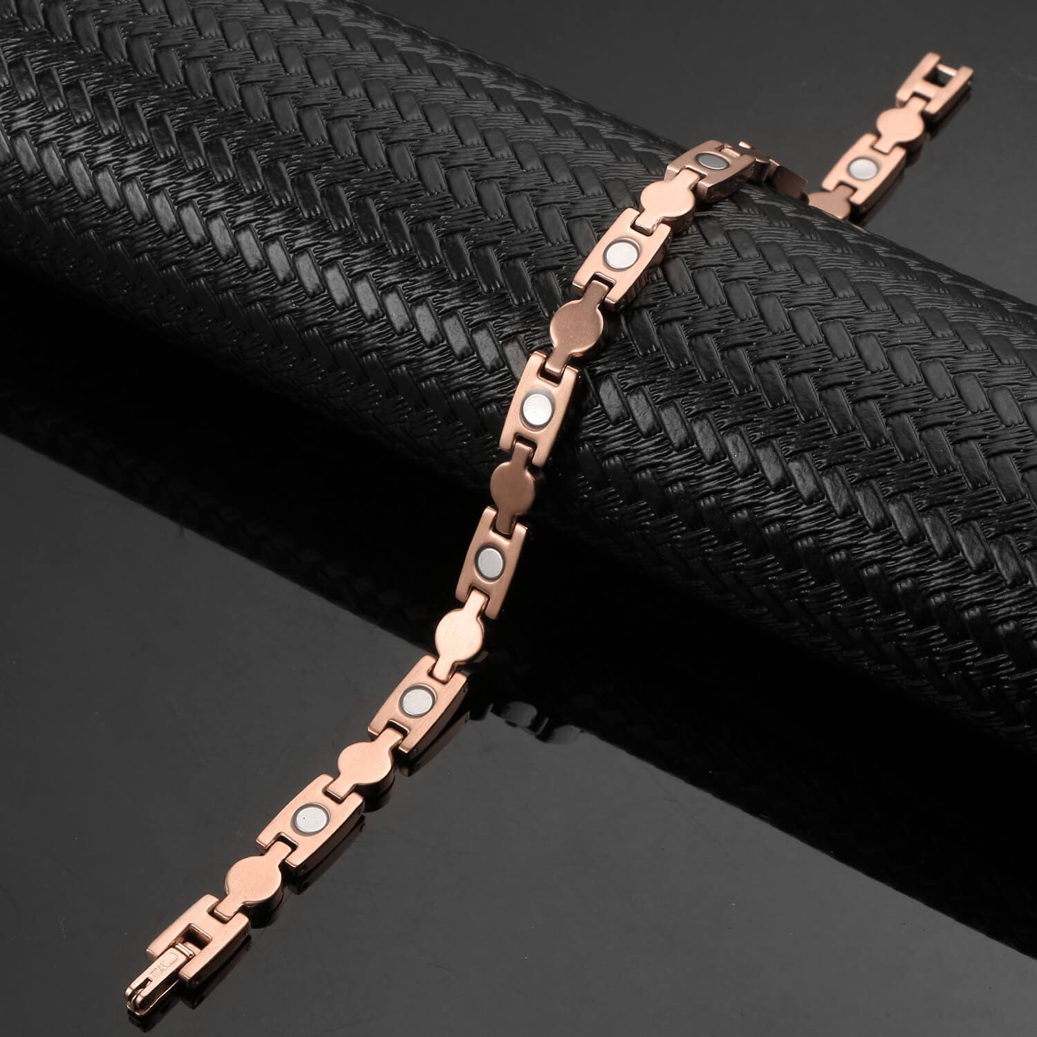 Melchior Jewellery rose gold magnetic bracelet with heart shaped links and black magnetic inserts
