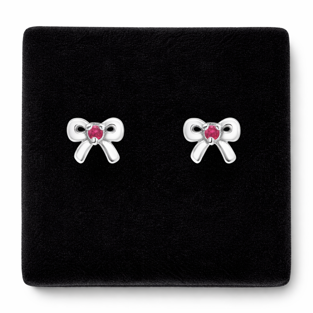 Melchior Jewellery silver bow earrings with red stones July birthstone earrings for kids