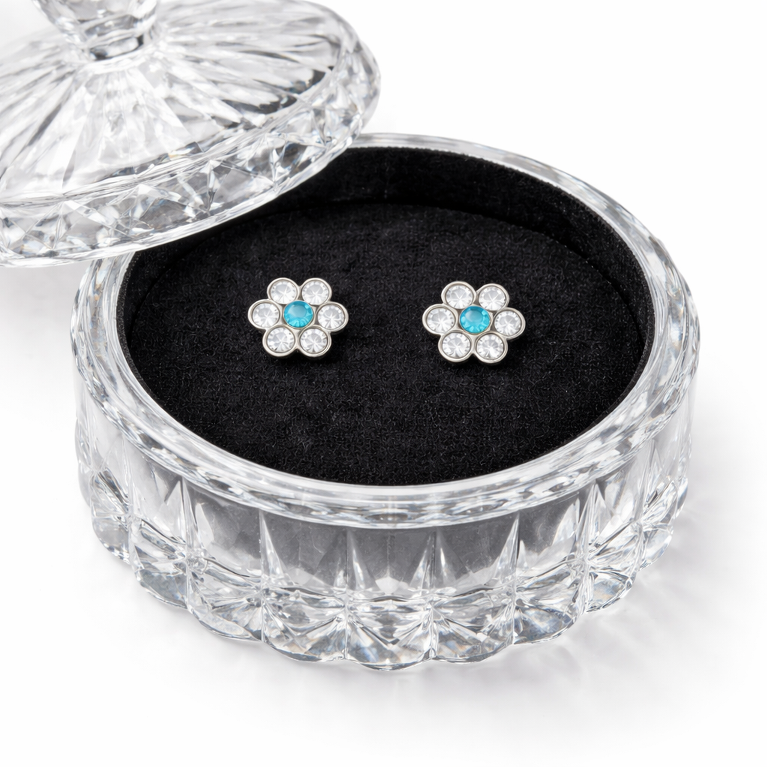 Kids crystal stud earrings hypoallergenic flower design displayed in a clear decorative jewellery box