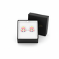 Kids sterling silver princess earrings with pink enamel in a black Melchior Jewellery box