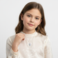 Child wearing Melchior Jewellery childrens necklace with a cute koala bear pendant on silver chain