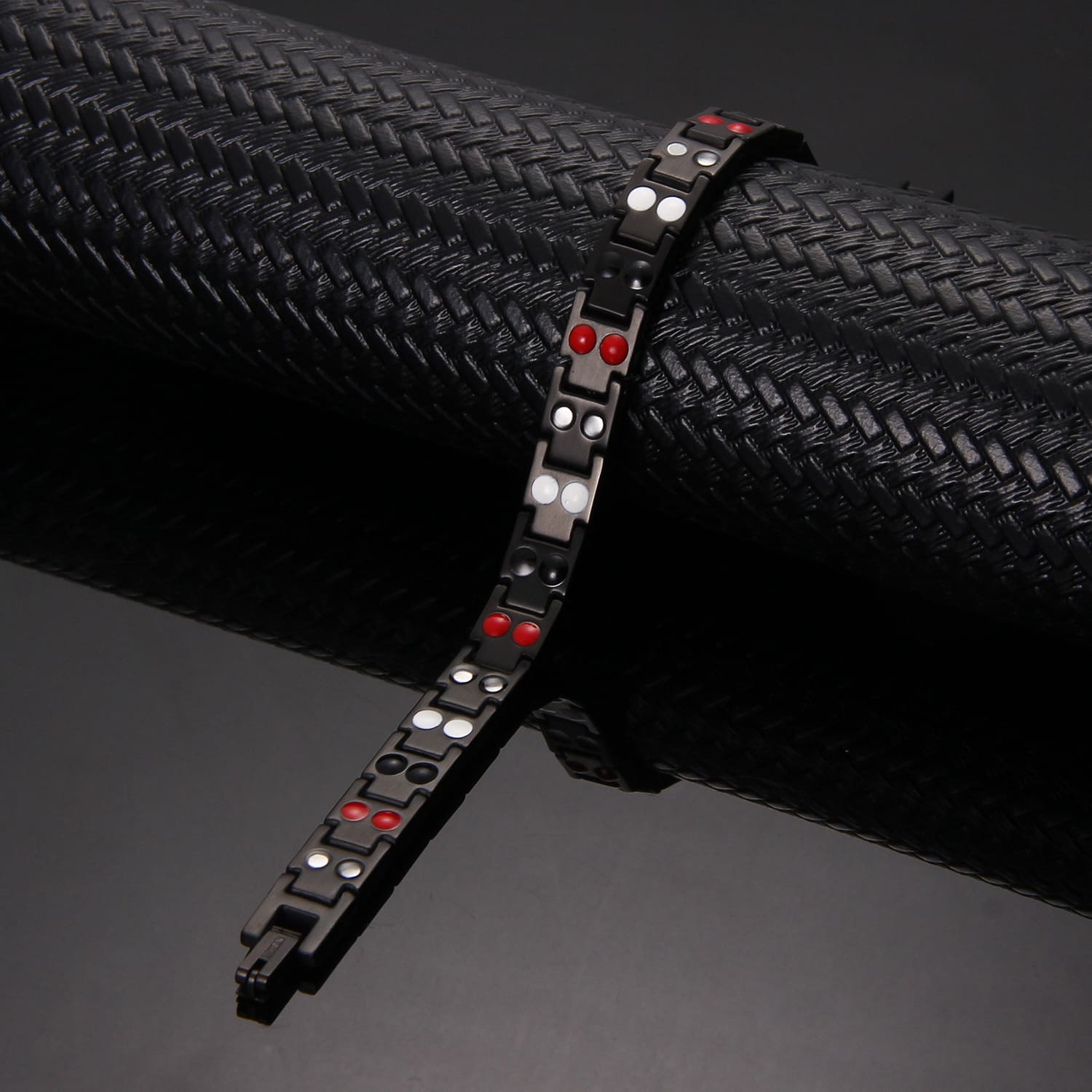 Melchior Jewellery ladies black titanium magnetic bracelet with linked black segments and red silver inserts