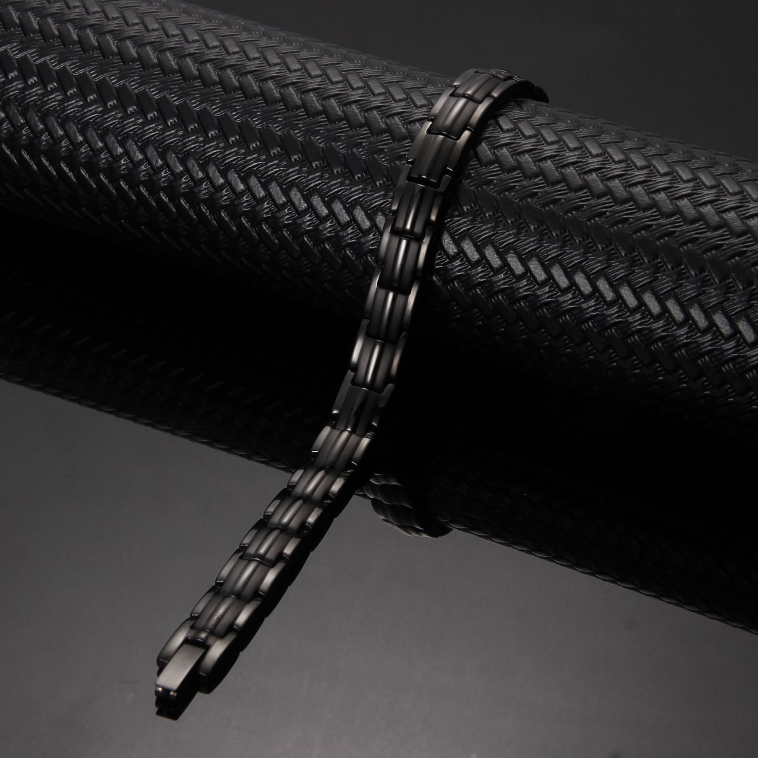 Melchior Jewellery ladies black titanium magnetic bracelet matte link design on textured black background