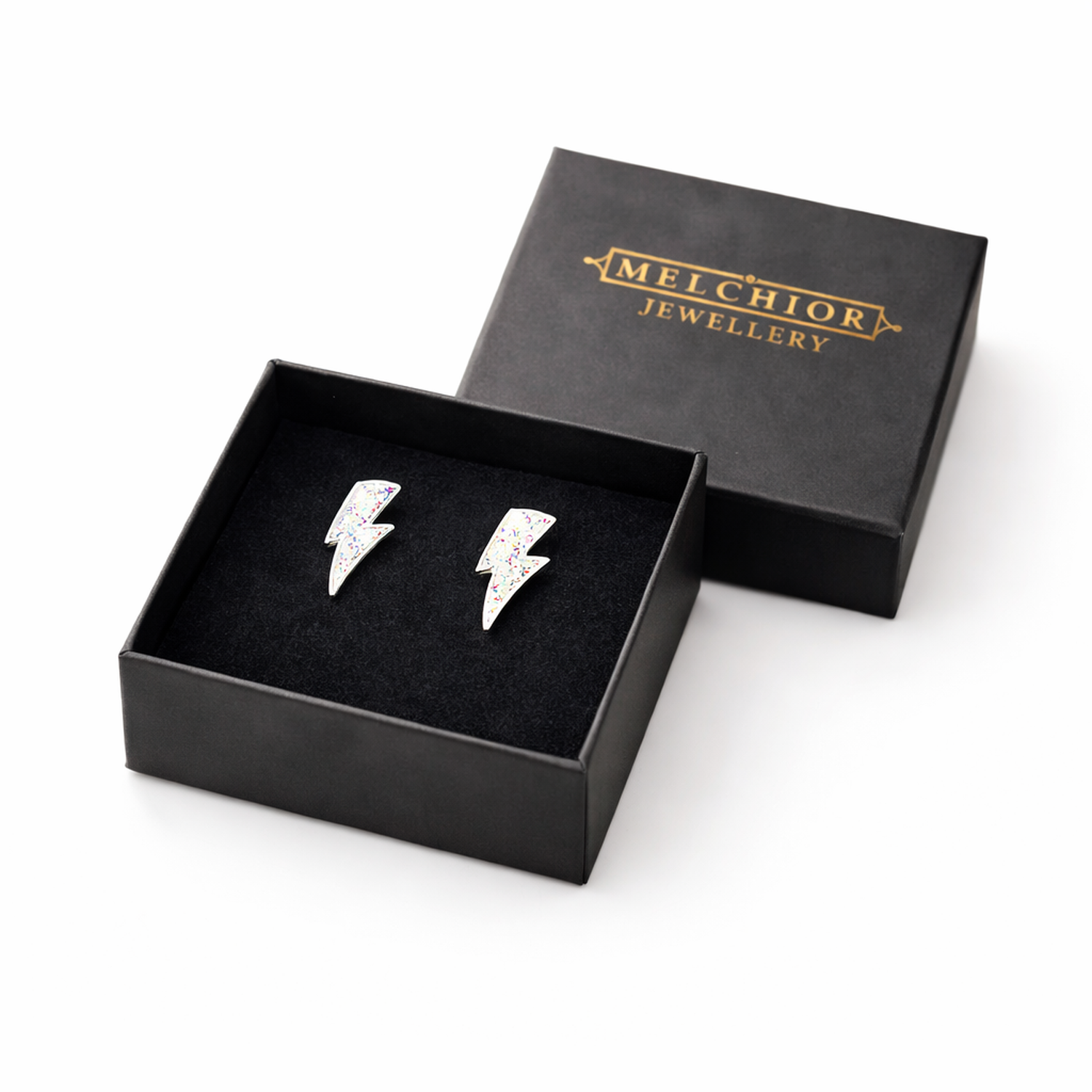 Melchior Jewellery lightning bolt stud earrings for kids in black gift box with gold logo