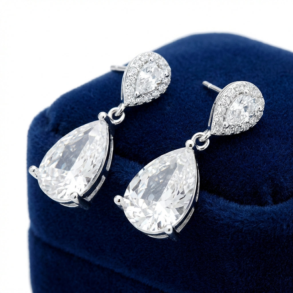 Melchior Jewellery luna wedding earrings for brides with sparkling teardrop crystals in silver setting