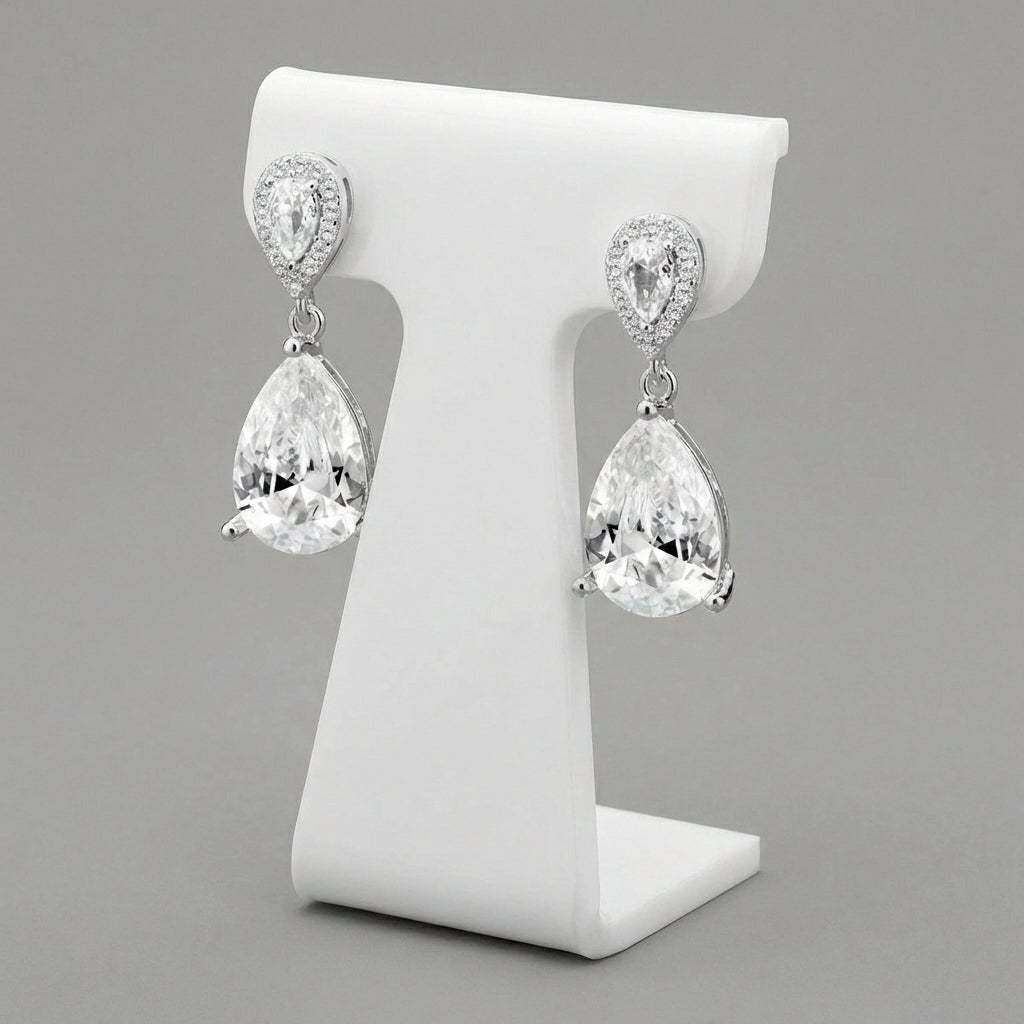 Melchior Jewellery luna wedding earrings for brides with pear-shaped crystal drops and silver setting