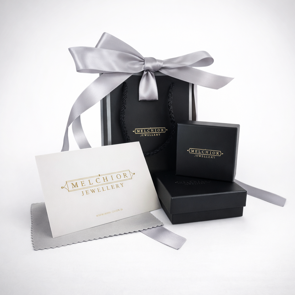 Melchior Jewellery luxury jewellery gift wrap including black boxes and bag with silver ribbon bow
