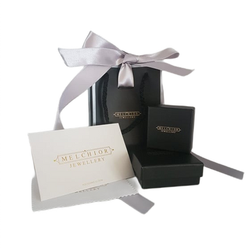 Melchior Jewellery luxury jewellery gift wrap with black box and silver ribbon bow for elegant presentation
