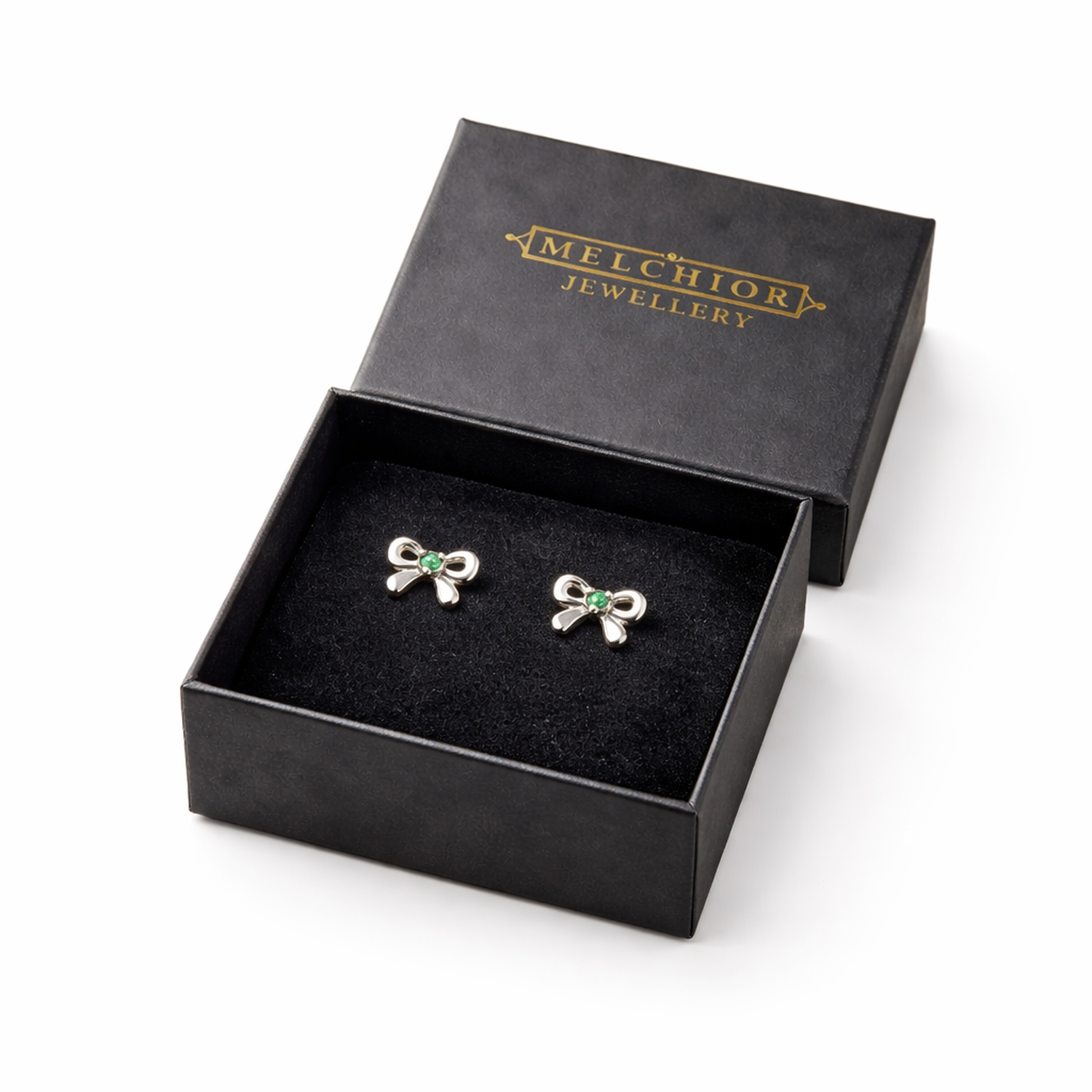May birthstone stud earrings for kids in silver bow design by Melchior Jewellery in black box