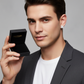 Man wearing a mens 7mm silver earring holding an open black jewellery box from Melchior Jewellery