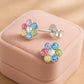 Melchior Jewellery multicoloured diamante stud earrings for girls in flower design on pink display