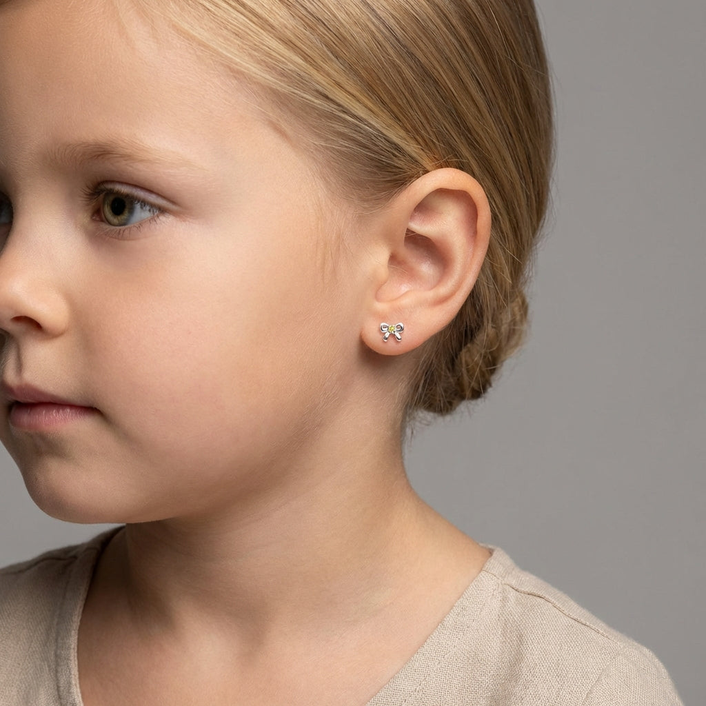 Melchior Jewellery November birthstone earrings for girls worn on young girl's ear in close-up