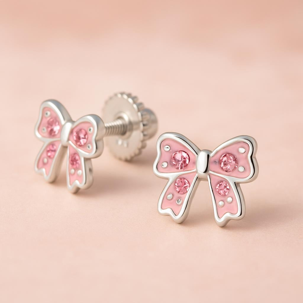 Melchior Jewellery pink crystal screw back earrings for girls shaped like bows with pink stones