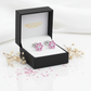 Pink flower screw back earrings for girls displayed in black Melchior Jewellery box with delicate decorative flowers