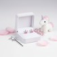 Princess pink stud earrings for kids by Melchior Jewellery displayed in white box with unicorn and princess accessories